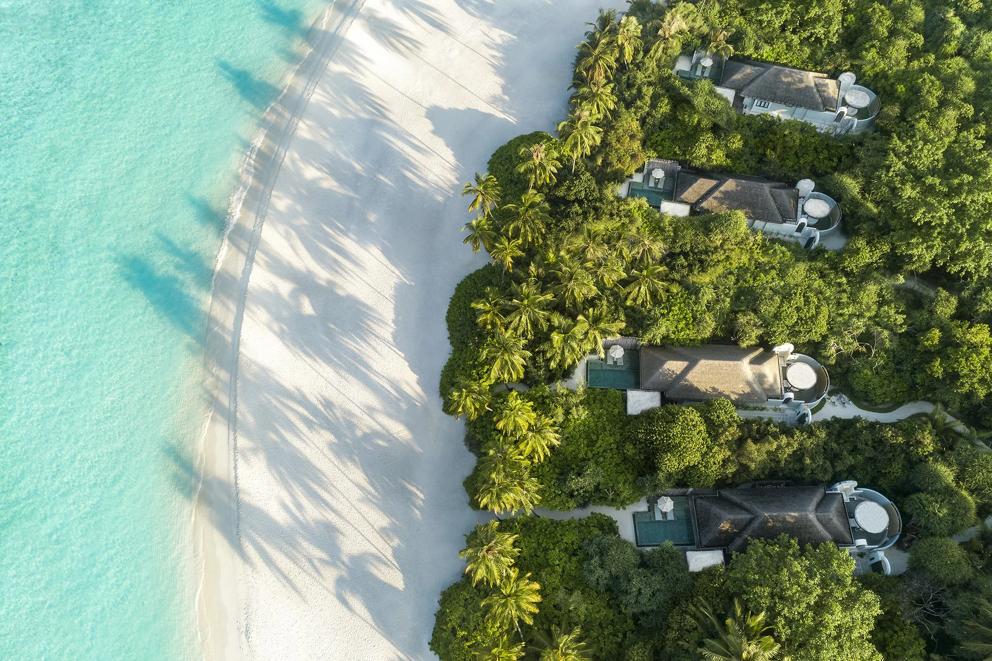 Anantara Kihavah Maldives Sunset Beach Pool Villa Aerial.JPG