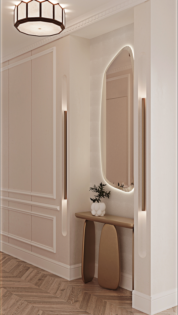 Un intérieur élégant avec un miroir oval lumineux, une console beige, un vase blanc avec des plantes vertes, et un plafond avec un luminaire en forme de cercle