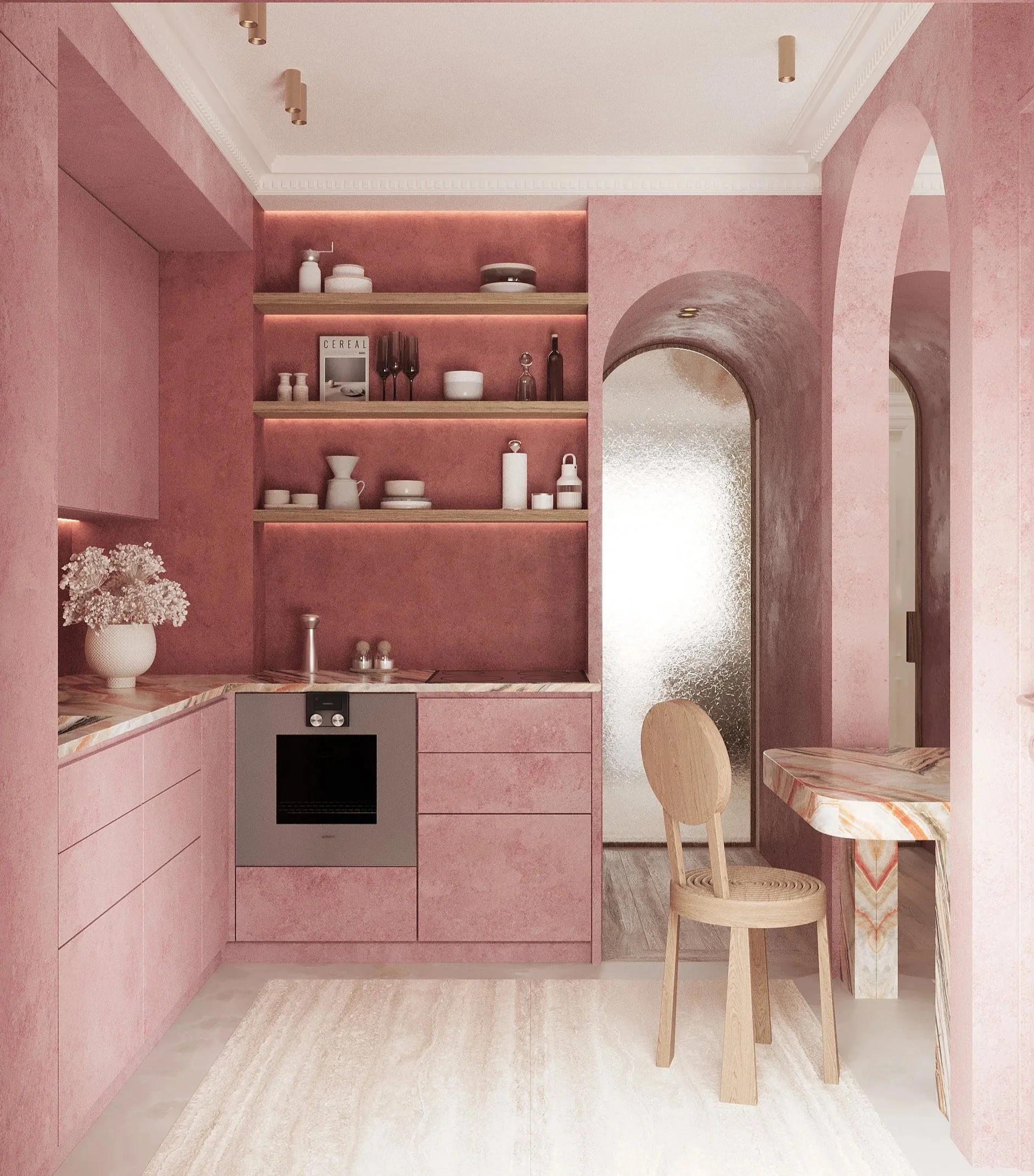 Une cuisine moderne avec des murs roses, des étagères en bois avec de la vaisselle et des accessoires, un plan de travail en marbre, et deux chaises en bois.