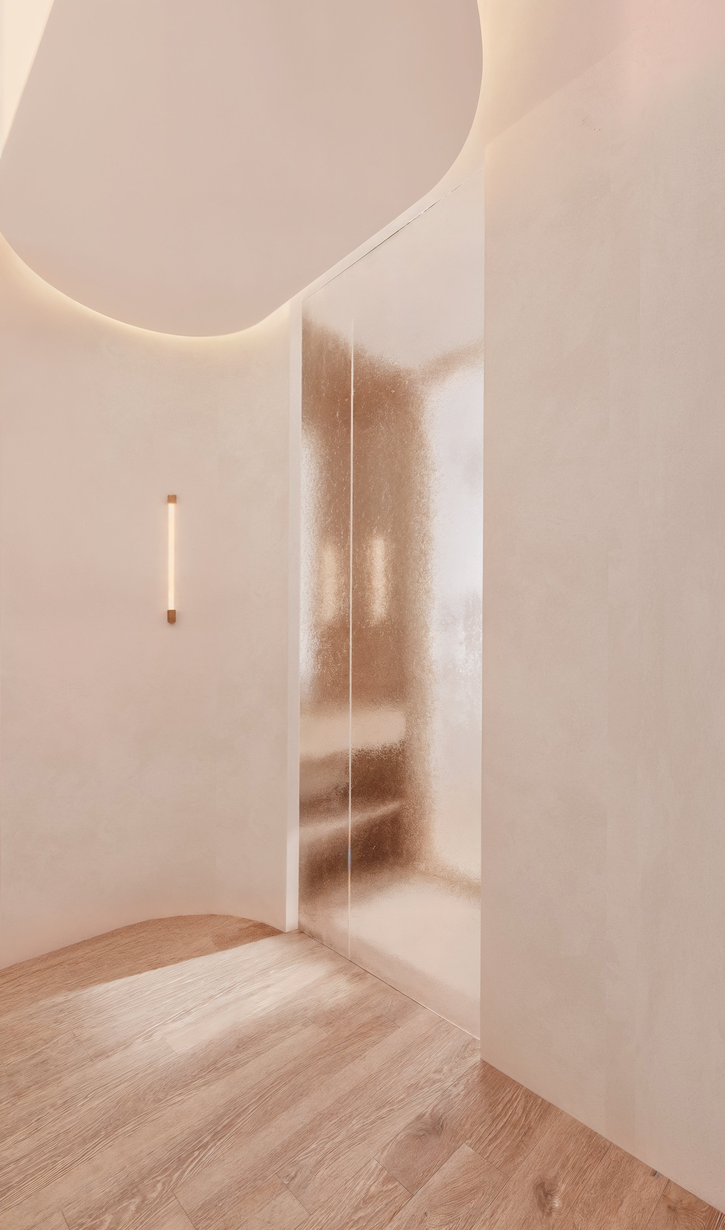 Un intérieur moderne avec des murs en ton neutre, un éclairage indirect et un sol en bois clair.
