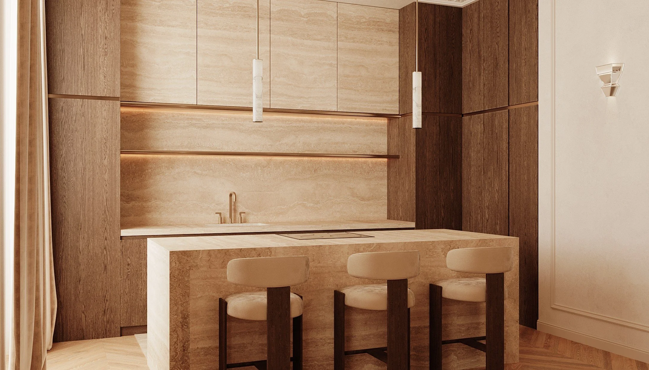 Cuisine moderne avec îlot en pierre beige, armoires en bois, deux suspensions en marbre au-dessus de l'îlot, et trois sièges de bar en face.