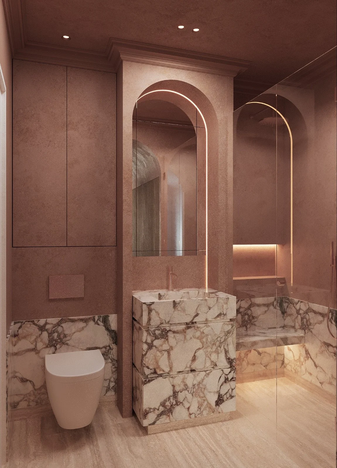 Salle de bain élégante avec des murs roses, un miroir incurvé avec éclairage LED, un lavabo en marbre, un WC suspendu, un sol en bois et une zone douche avec un mur en verre.
