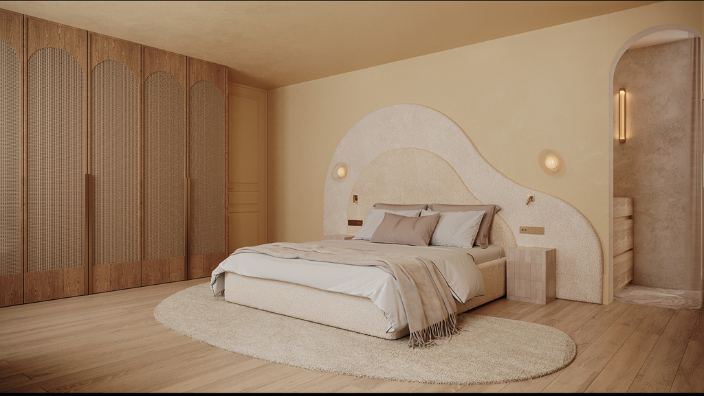 Chambre à coucher modern, avec un lit beige, draps blancs et oreillers dans des tons neutres, un tapis oval en tissu clair, un mur avec une décoration beige curviligne, un grand placard en bois avec des portes en rotin, et une porte menant à une sall