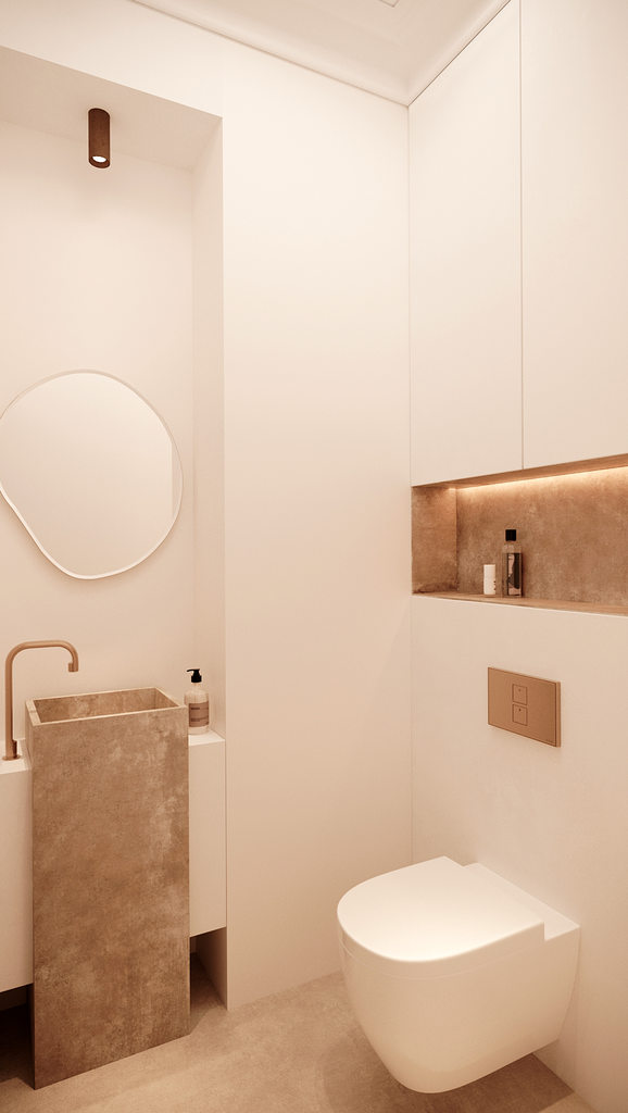 Petite salle de bain minimaliste avec un lavabo en béton, un miroir rond, une toilette suspendue, et des rangements encastrés avec éclairage intégré.