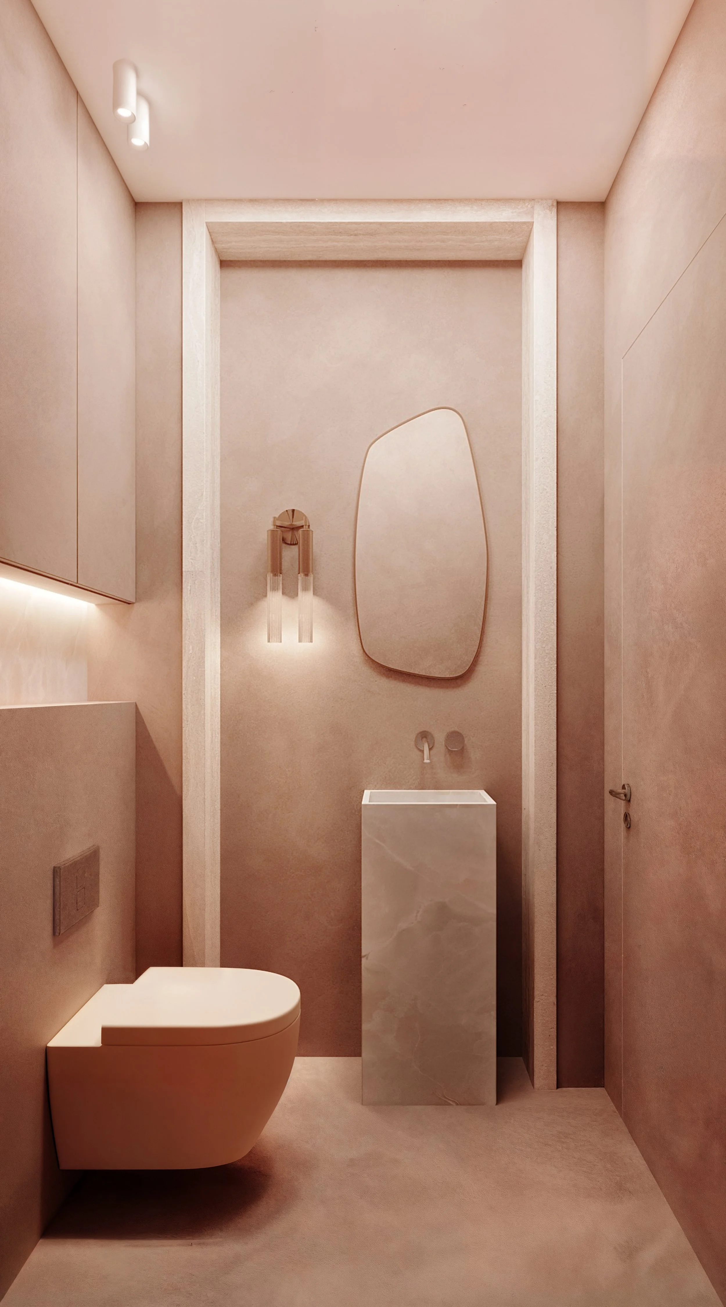 Toilettes modernes de couleur beige avec un miroir incurvé et un mur en pierre naturelle. L'éclairage est doux et minimaliste.