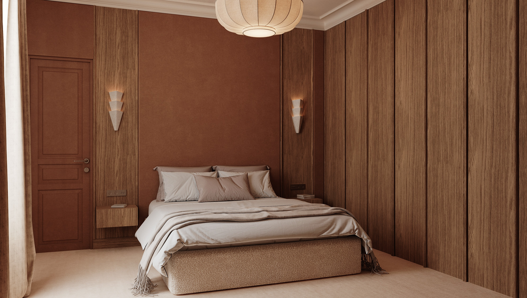 Chambre à coucher avec lit double, murs en bois, applique murale, porte en bois, et luminaire suspendu en plafond.