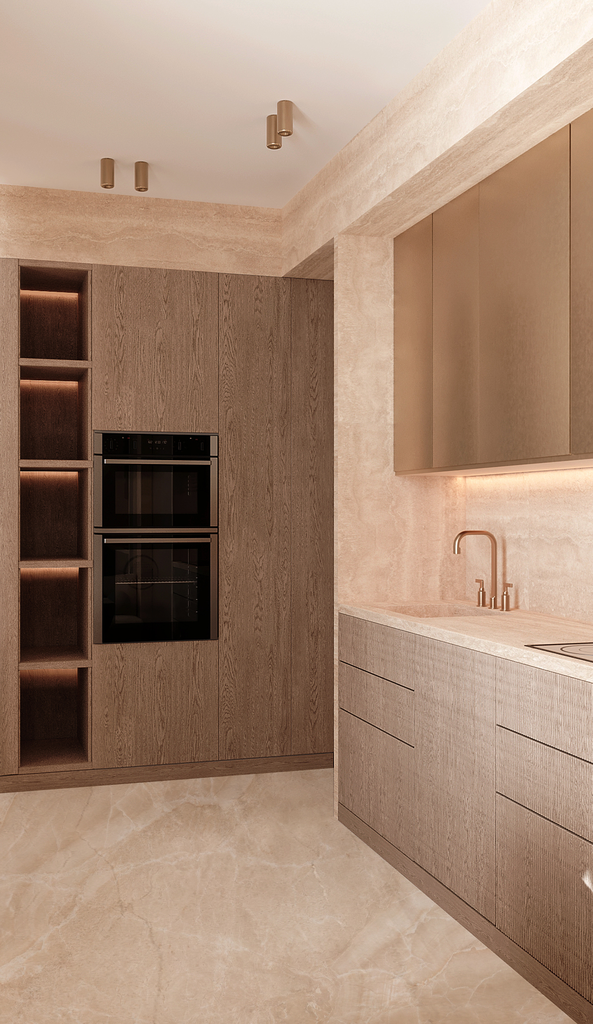 Intérieur d'une cuisine moderne aux tons beige et bois, avec un mur encastré, un évier en cuivre, et des armoires élégantes.