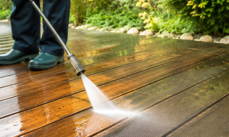 Professional pressure cleaning services Melbourne cleaning outdoor timber decking surface.