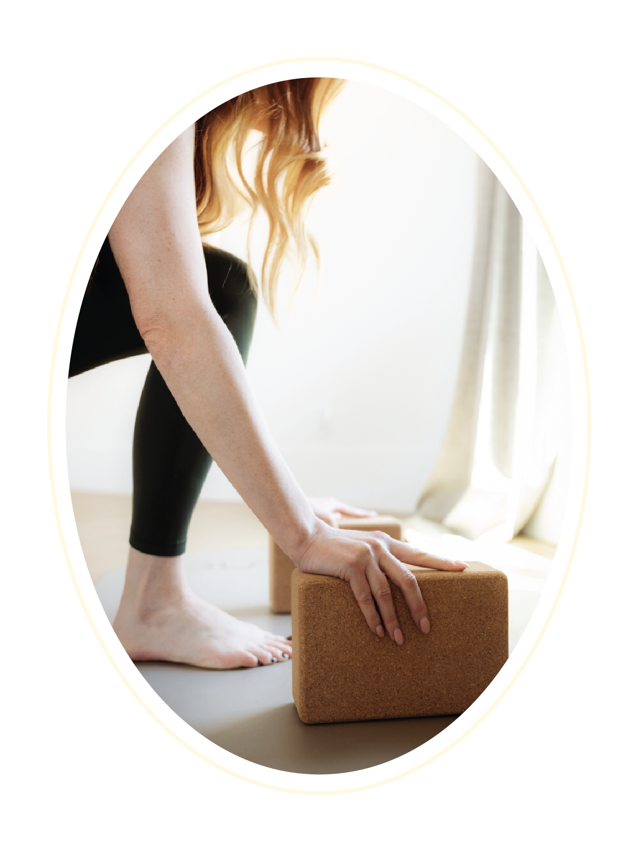 Participant performing a yoga move with a yoga block at Gathered Hearth Studio in Prince Albert