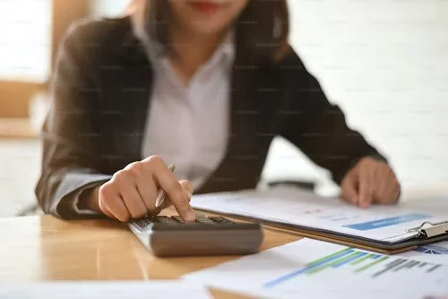 Woman with calculator