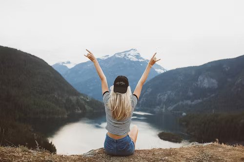 Woman in mountain scene