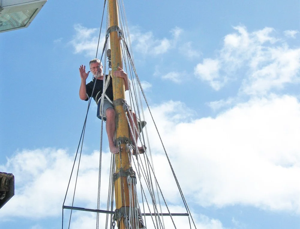 Larry Paul repairing the peak halyard block. December 2011.