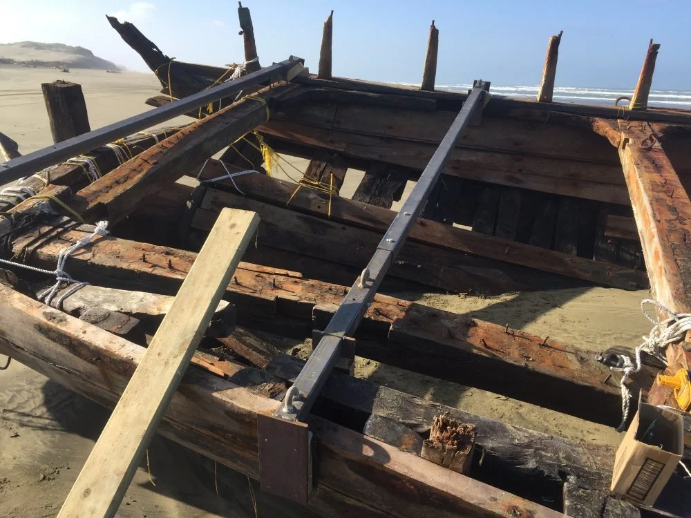 Temporary beams attached without damaging the timbers.