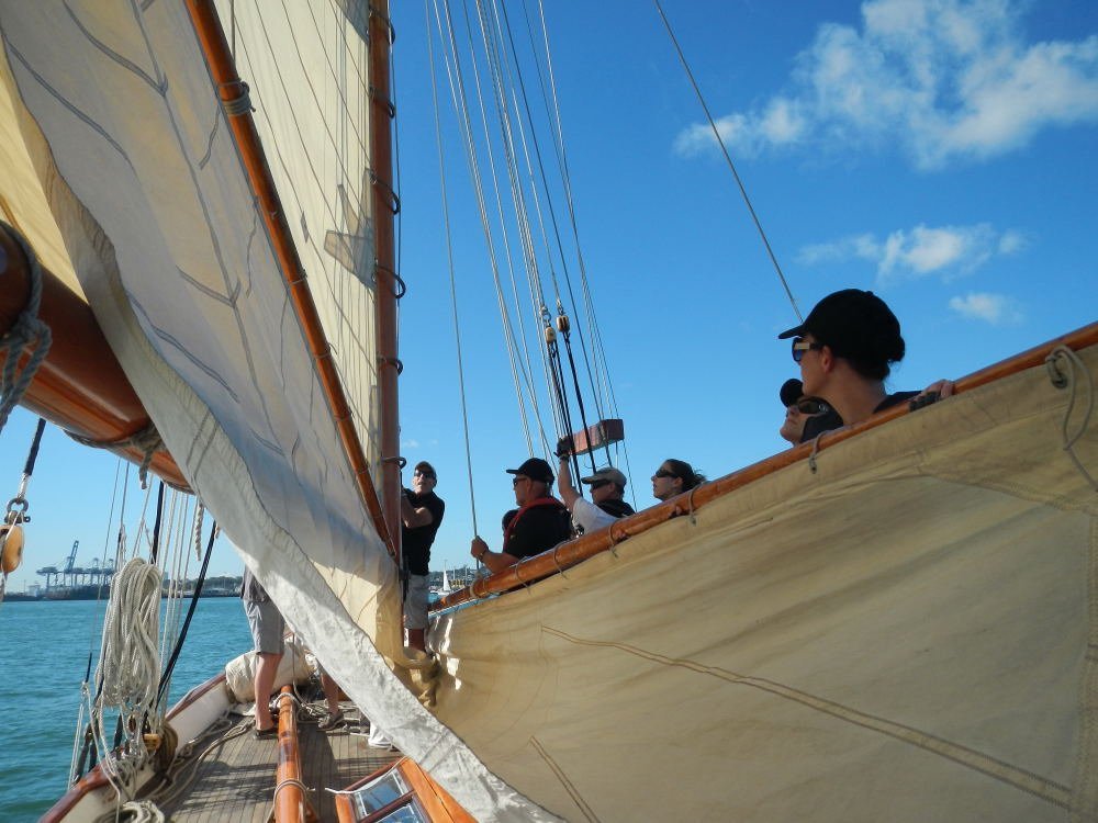 Hoisting the topsail.