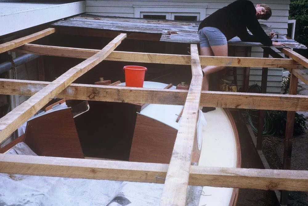 Peter demolishing temporary boatshed.
