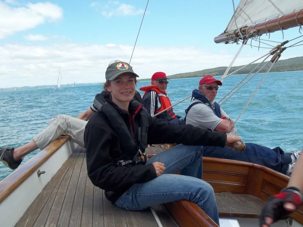 Laura Dekker (solo around the world yachtswoman) helming Waitangi in the Devonport Yacht Club race 25th November 2012.
