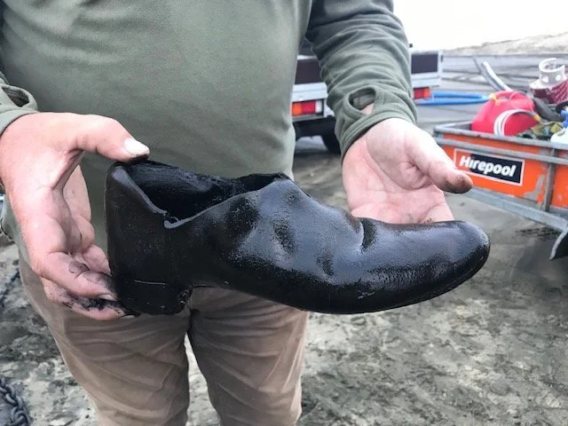 Shoe located in the bilge.
