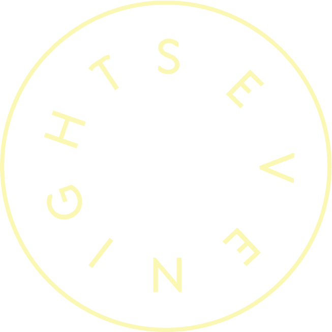 Seven Nights logo yellow