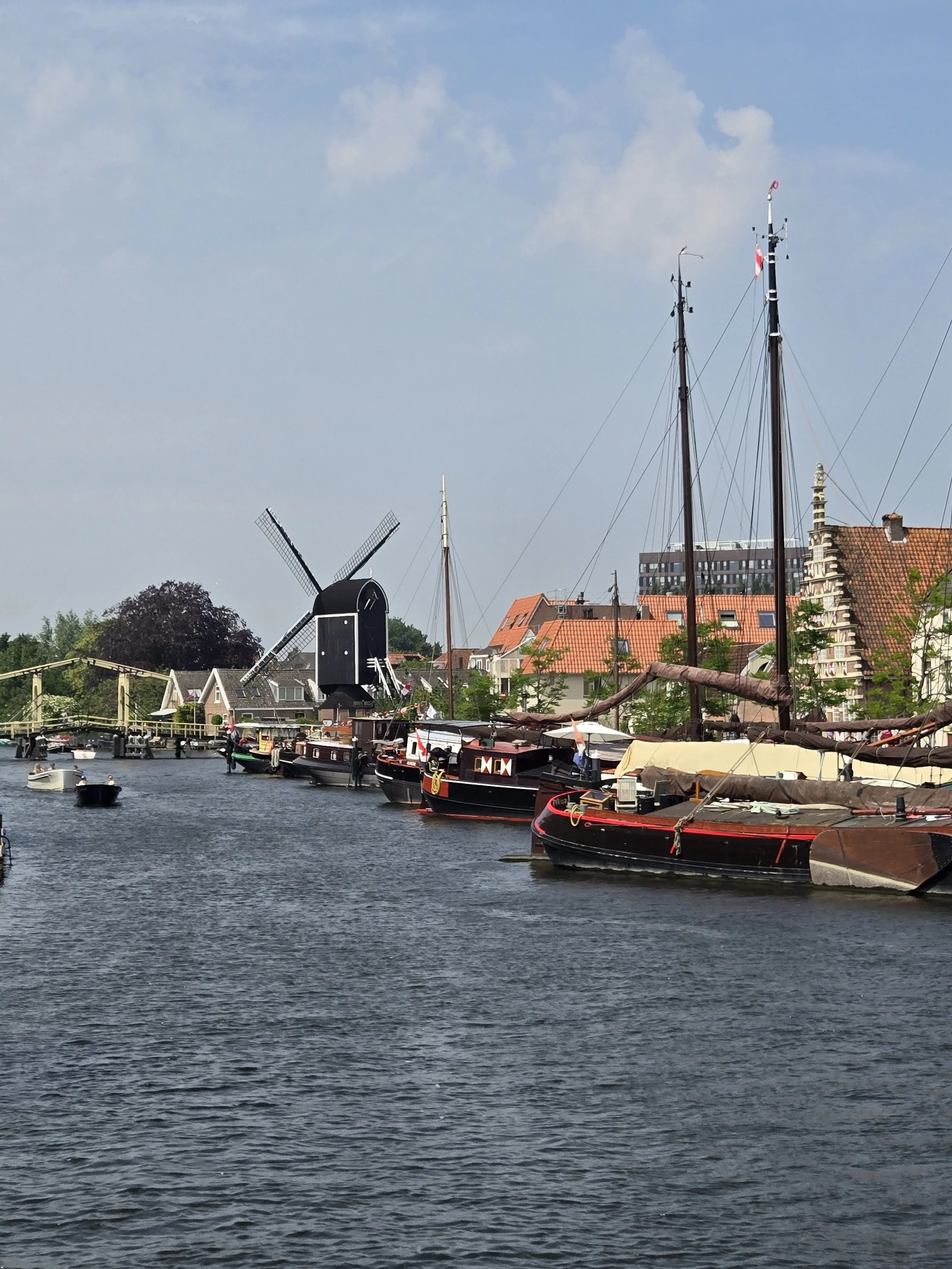 historic canal and windmill in Leiden