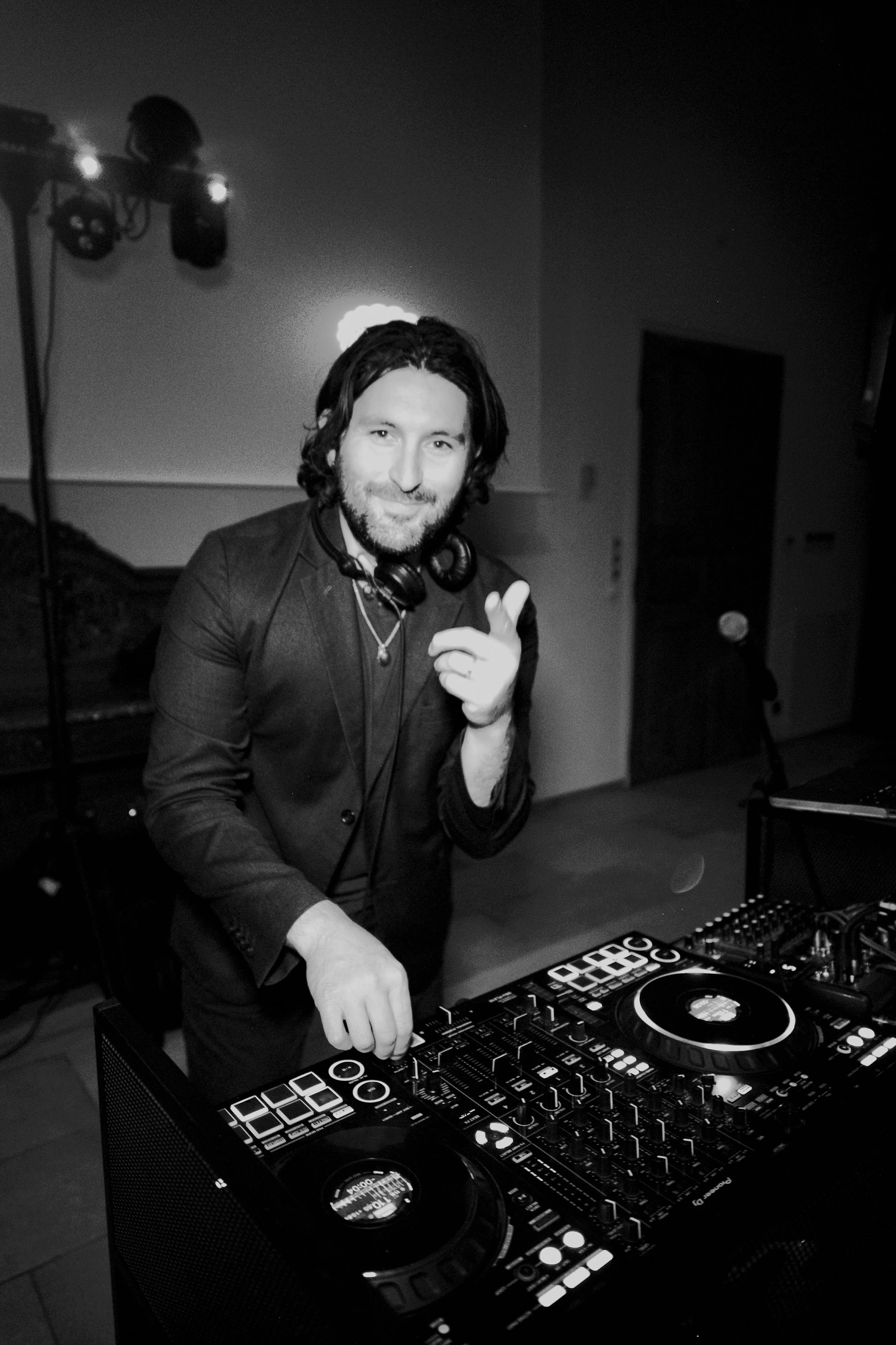 Mat the DJ mixing during wedding party at Château Hermitage de Combas, Servian, Hérault