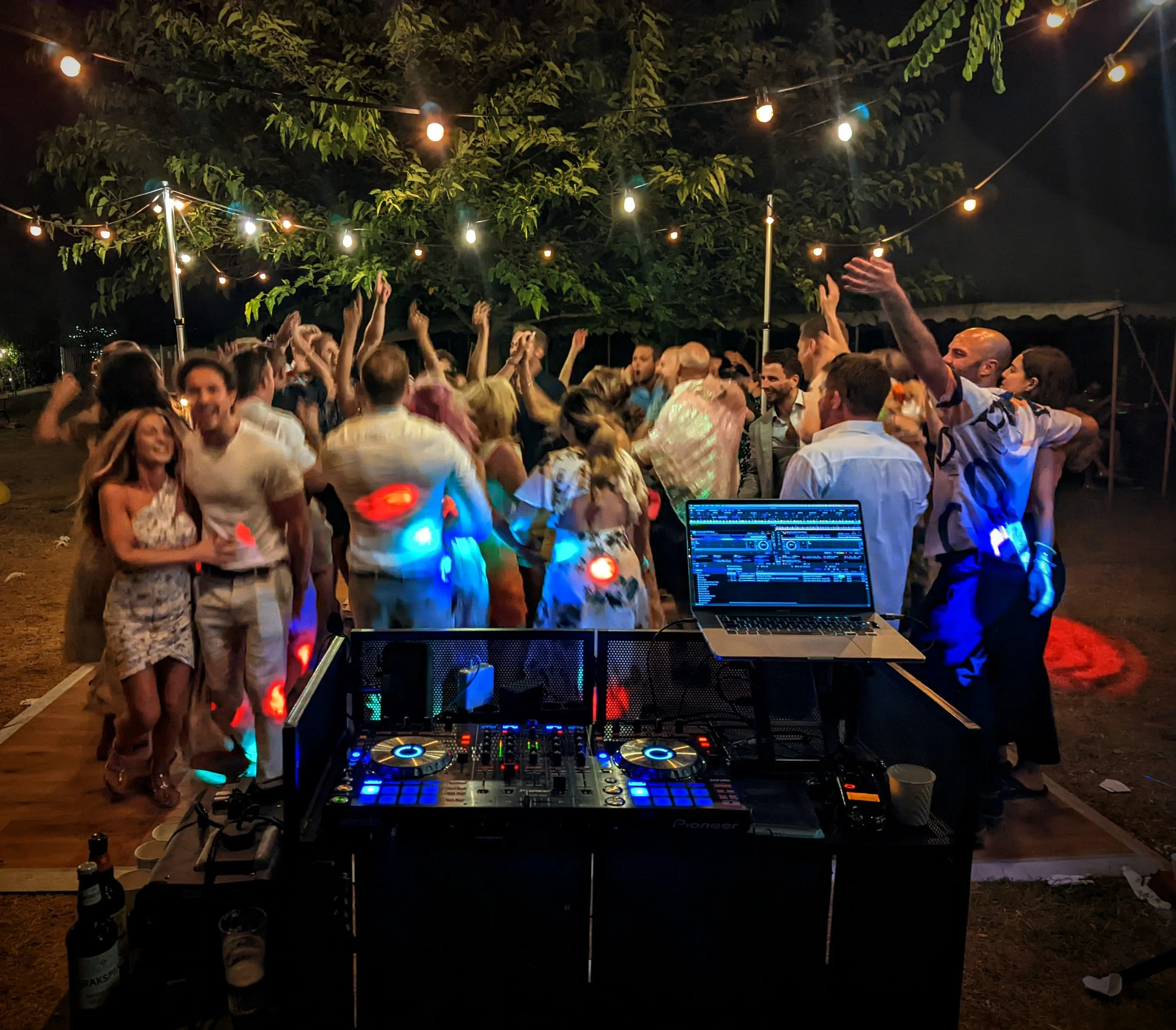 Mat the DJ mixing during the evening party at private residence Cote d'Azur