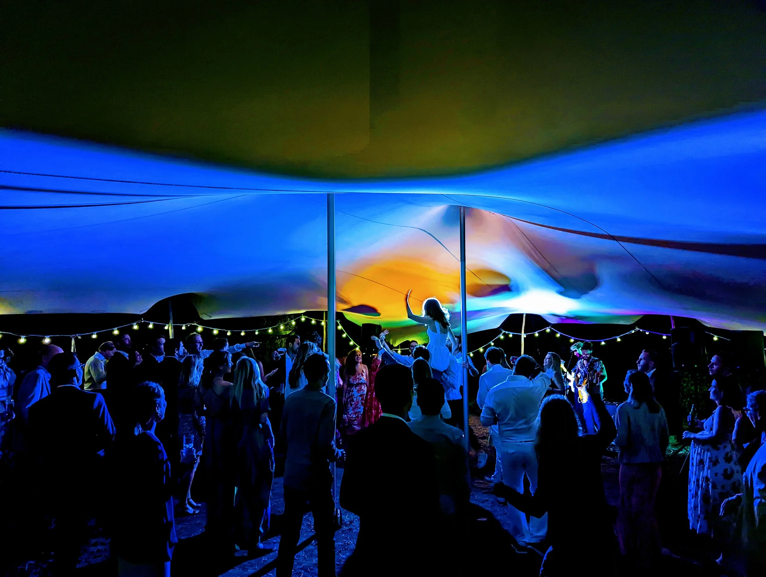 Packed dancefloor at a summer festival in France