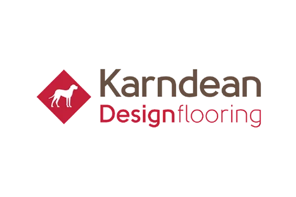 Logo for Kamdear Design & Flooring featuring a white dog silhouette inside a red diamond shape, with the company name and specialty text.