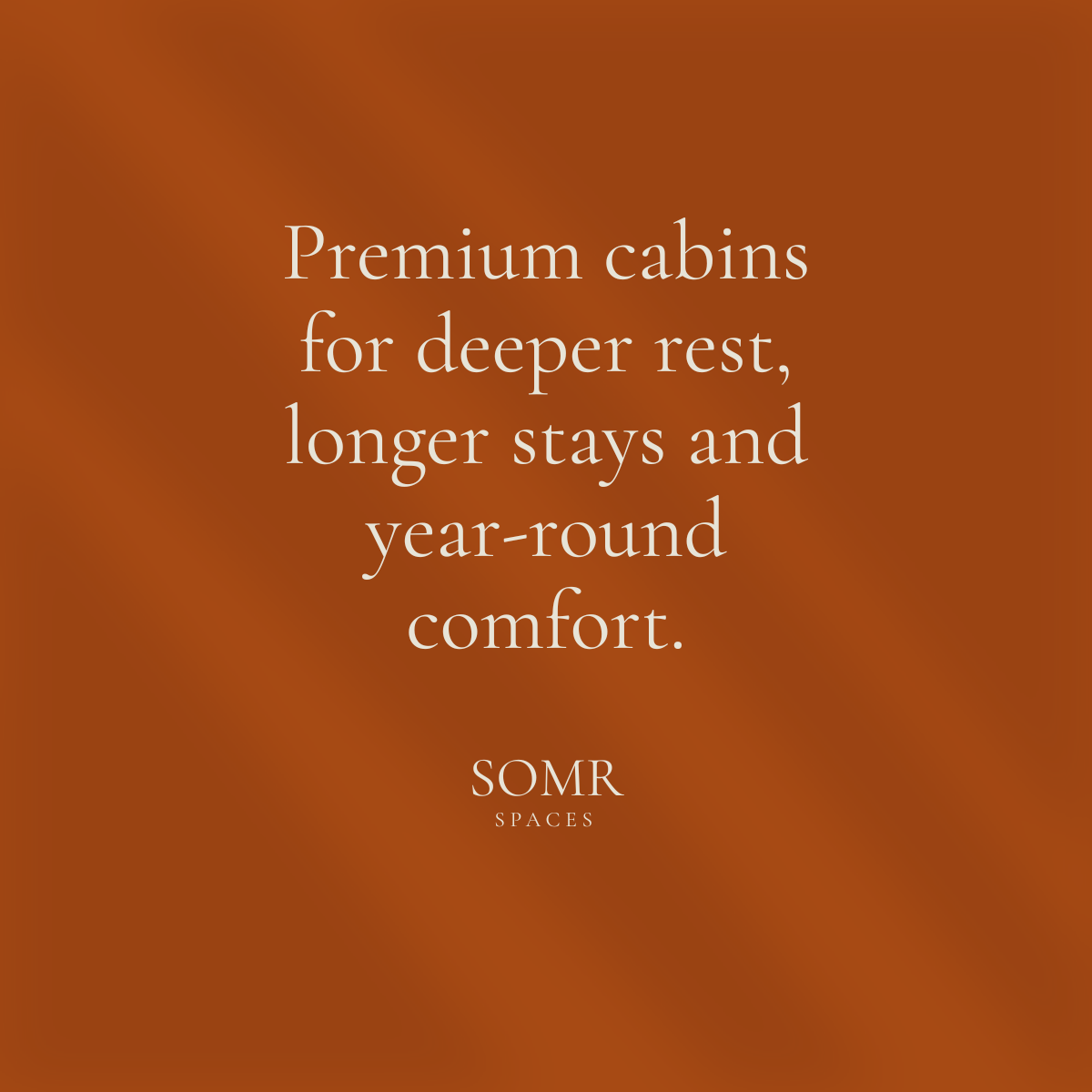 A promotional image with a brown gradient background and white text that reads, "Premium cabins for deeper rest, longer stays and year-round comfort." The bottom of the image features the logo "SOMR SPACES."