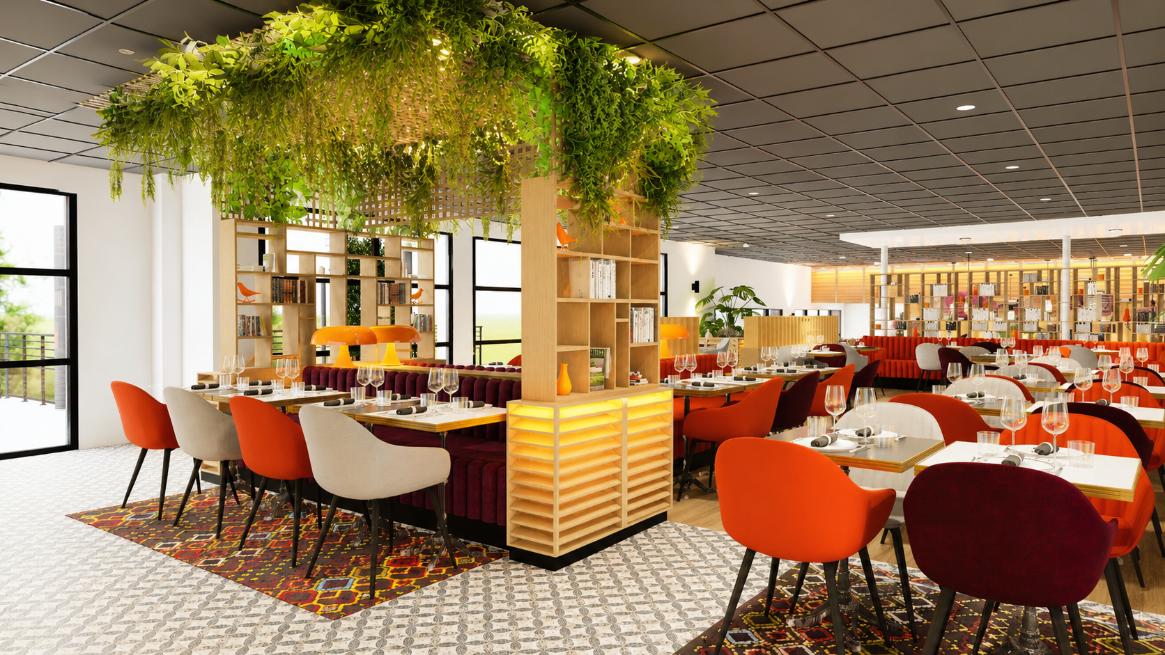 Un restaurant habillé de verdure : végétation tombante, îlot central en bois et luminaires graphiques composent un intérieur vivant, généreux et plein de caractère.