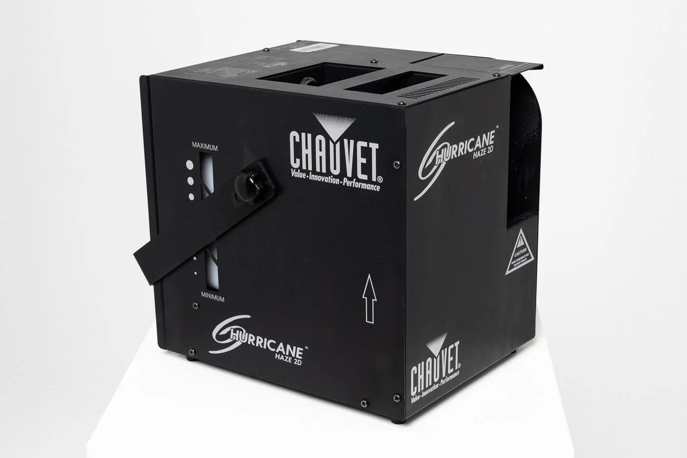 Chauvet Hurricane Haze 2D — water-based haze machine producing a fine, continuous atmospheric haze that enhances visible light beams, lasers and projection effects. Features adjustable haze output and blower speed for controlled studio use.