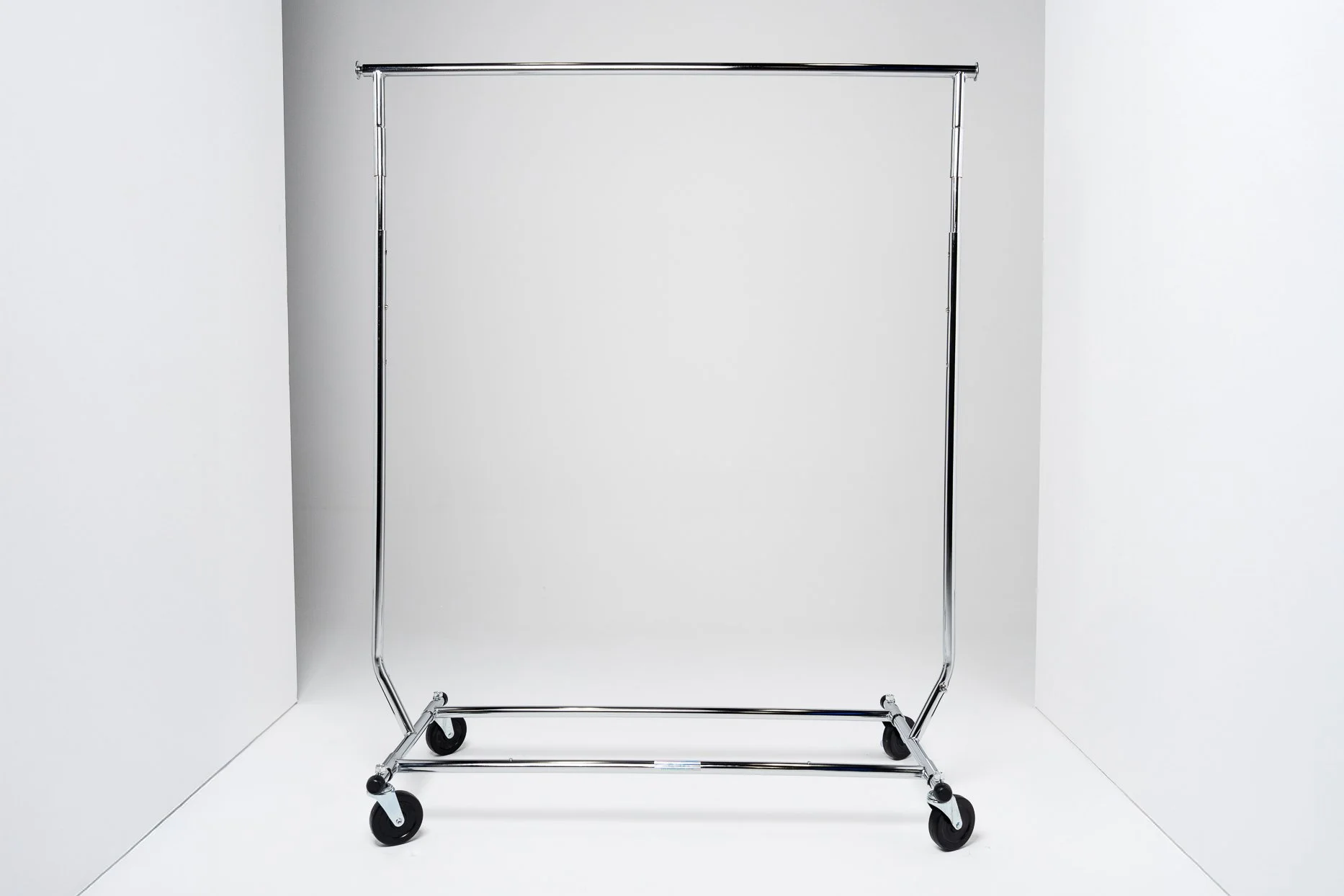 Mobile Clothing Rack — heavy-duty chrome garment rack on castor wheels for wardrobe organisation, styling and on-set clothing changes. Adjustable height and easy to reposition throughout the studio.