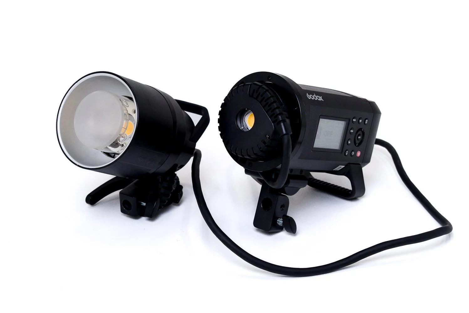 Godox AD600Pro with H600P Extension Head — allows the flash head to be positioned separately from the main AD600Pro body for easier boom mounting and overhead lighting setups. Includes the AC26 mains power adapter for continuous studio power, while r