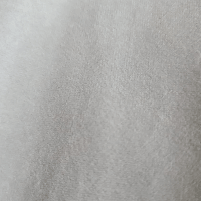Plain gray textured wall or surface.