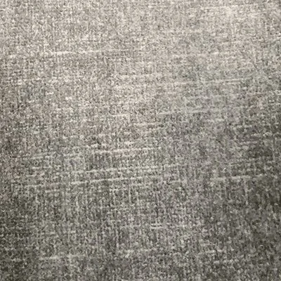 Close-up of a gray textured carpet