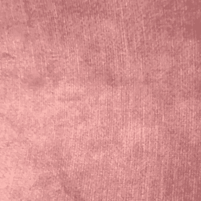 Close-up image of pink fabric, likely clothing material.