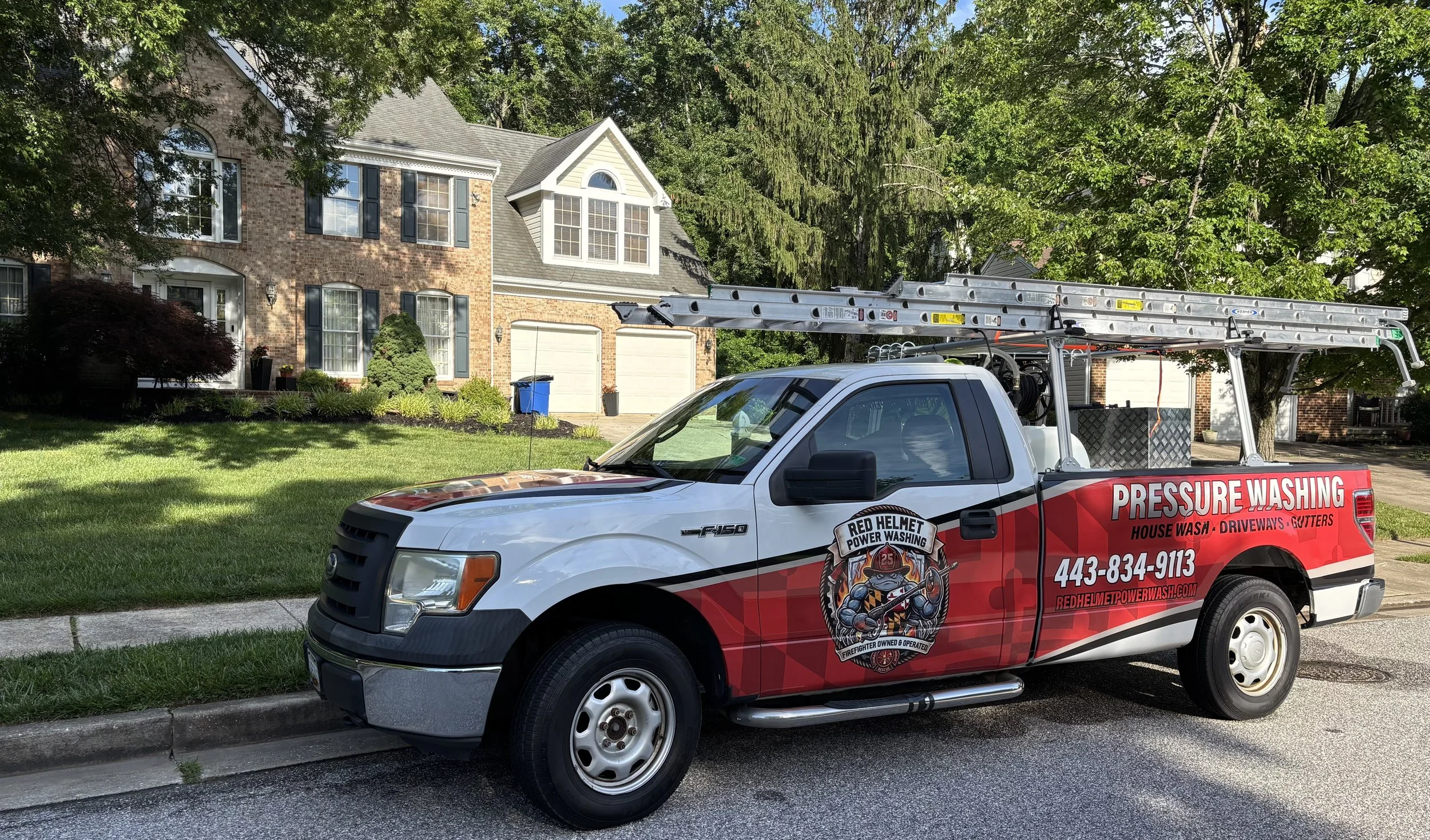Beautiful Owings Mills home in Maryland. House soft washing, deck cleaning and concrete patio cleaning by Red Helmet Power Washing.