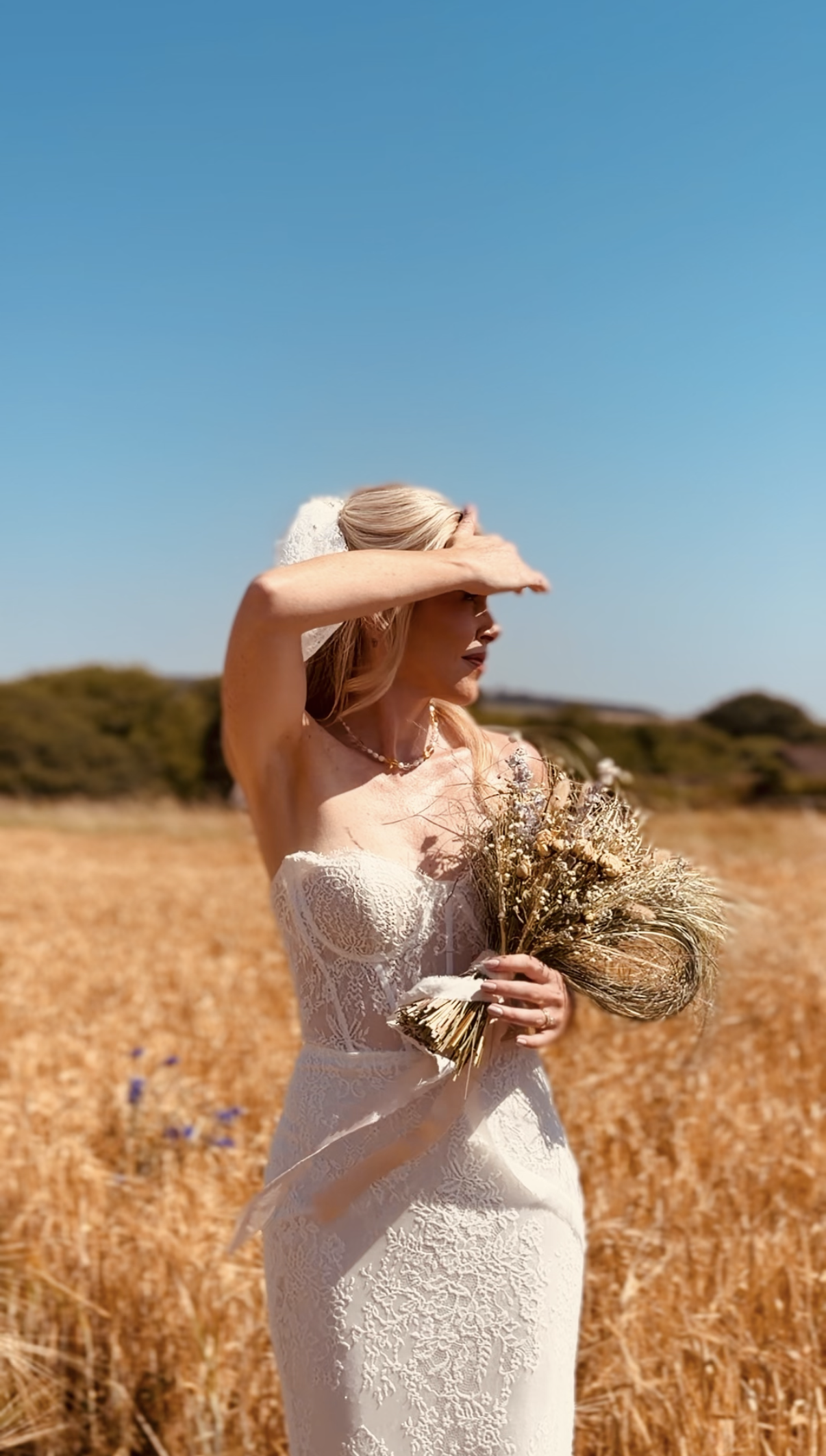 Bride in a barley field.png