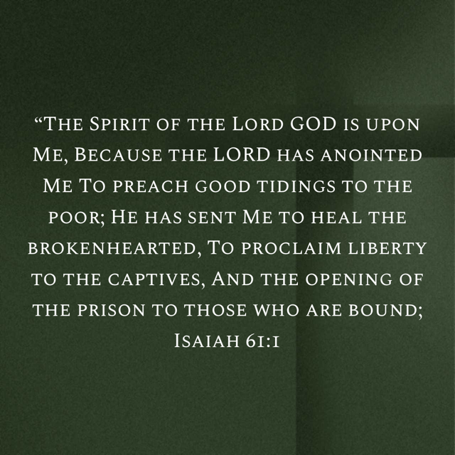 A dark green background with white quote text from Isaiah 61:1, about the Lord's mission to heal, proclaim liberty, and open prisons.