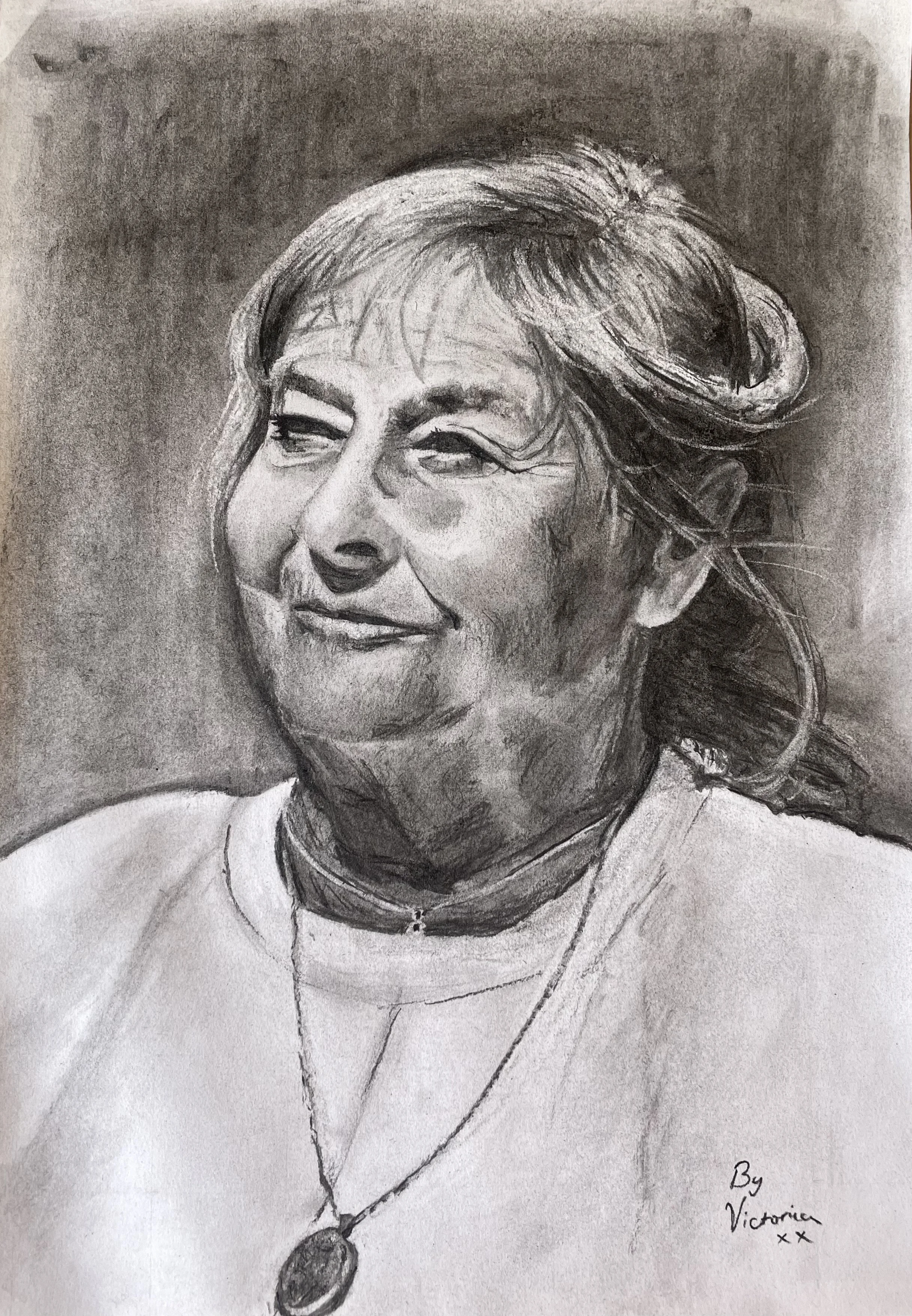 Charcoal from photograph taken by artist. My Mum basking in the garden sunshine. 