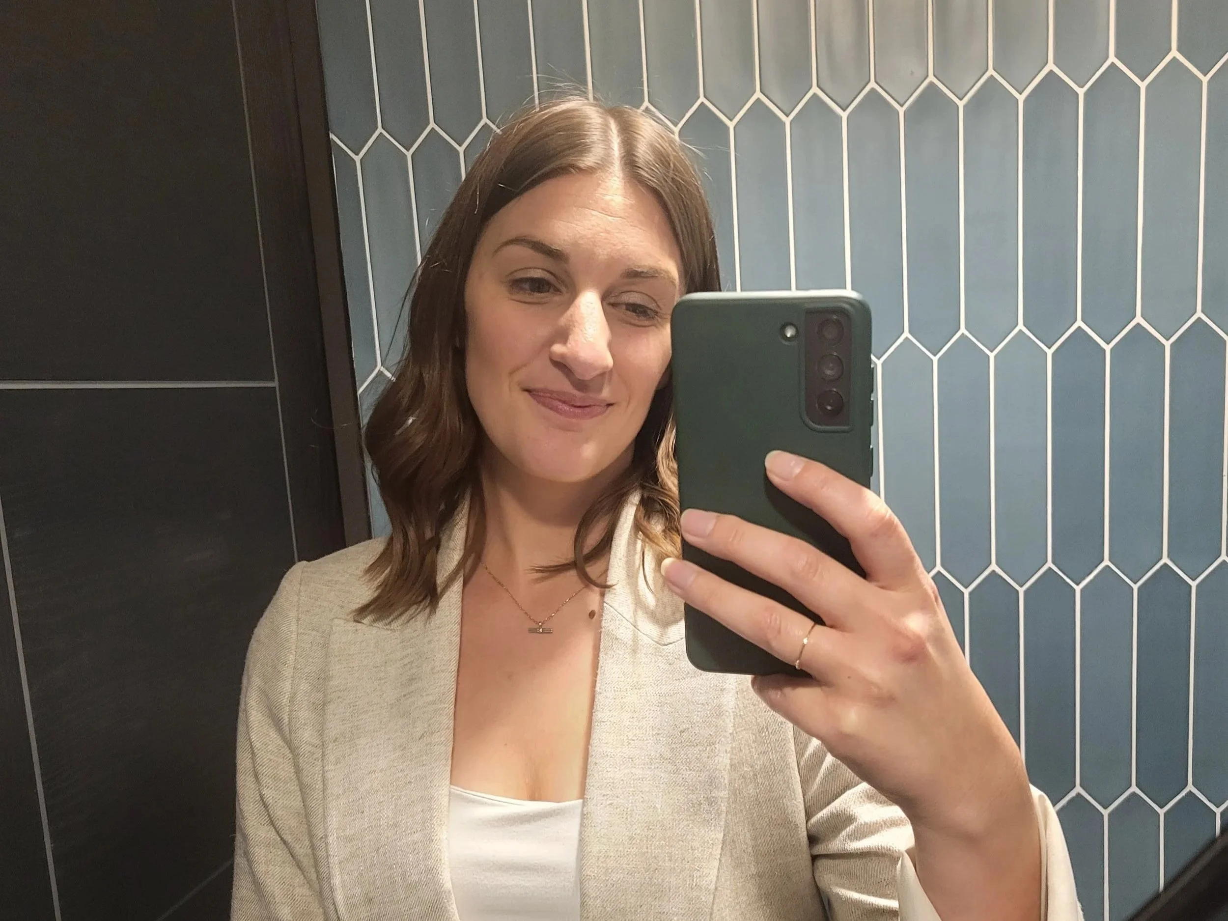 Erin Claire Butler selfie — building a financially stable lifestyle business on her own terms