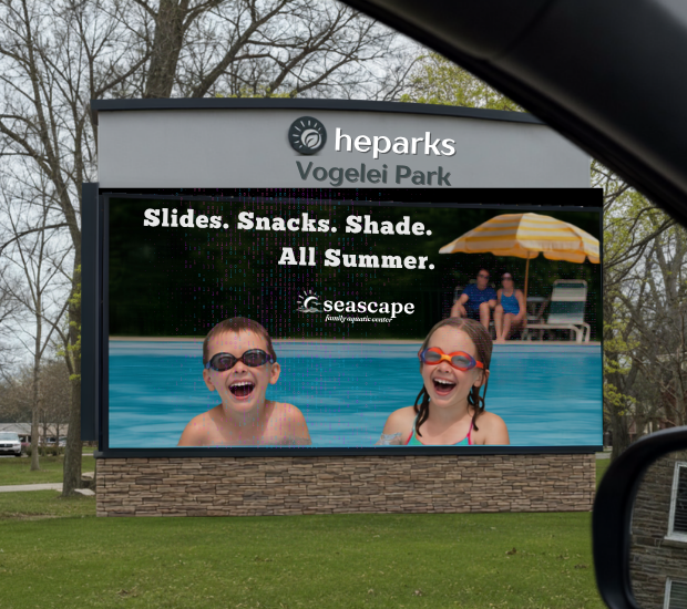 digital billboard kids in pool with parents relaxing