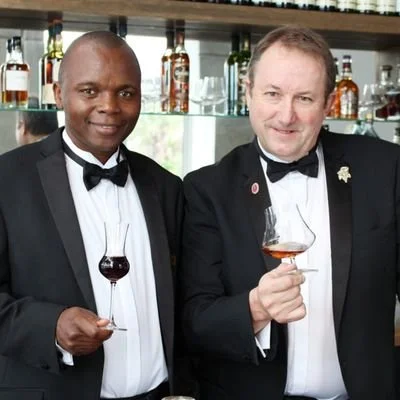 Ndosi and Denis Garret