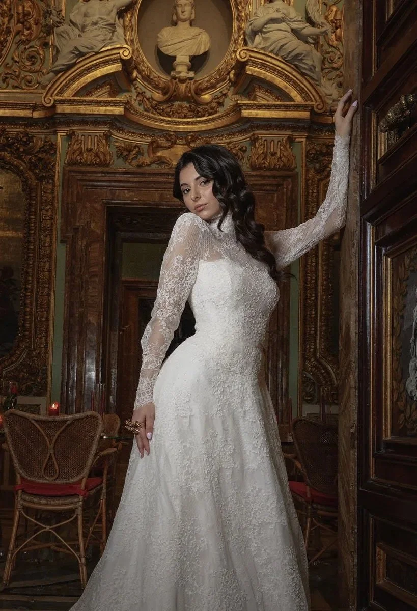 Bride standing inside historic palace during luxury wedding editorial in Rome
