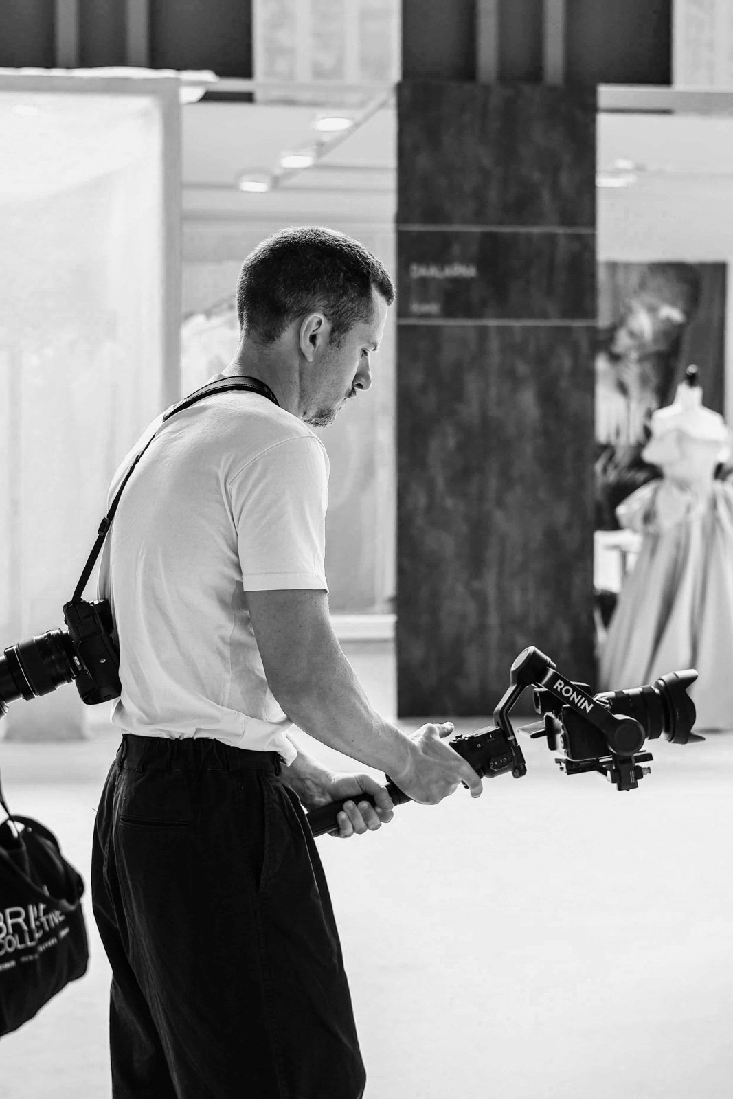 Wedding photographer and filmmaker capturing luxury bridal content during editorial workshop