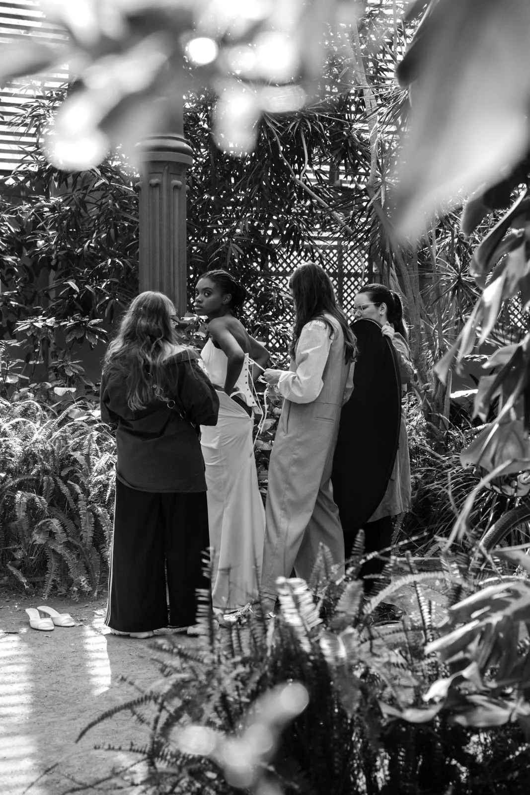 Wedding planners and creative team coordinating a luxury bridal editorial experience