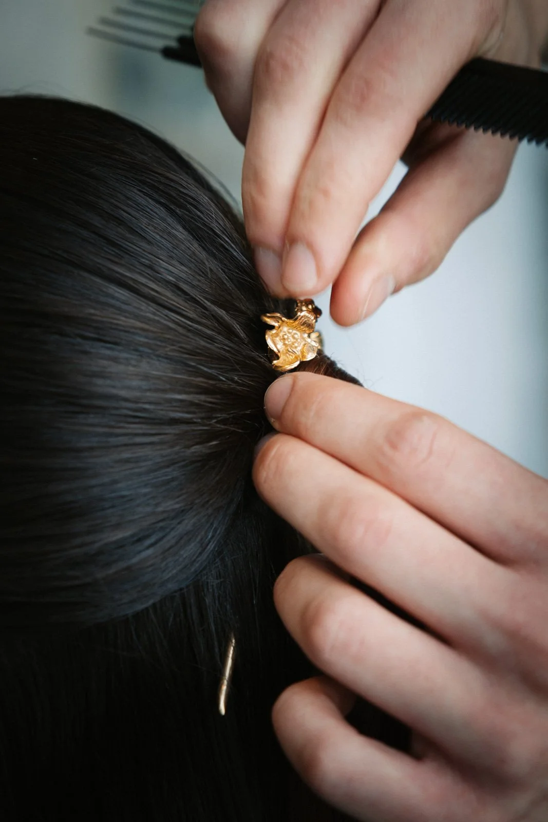 Close up detail of bridal hair accessory during editorial wedding styling