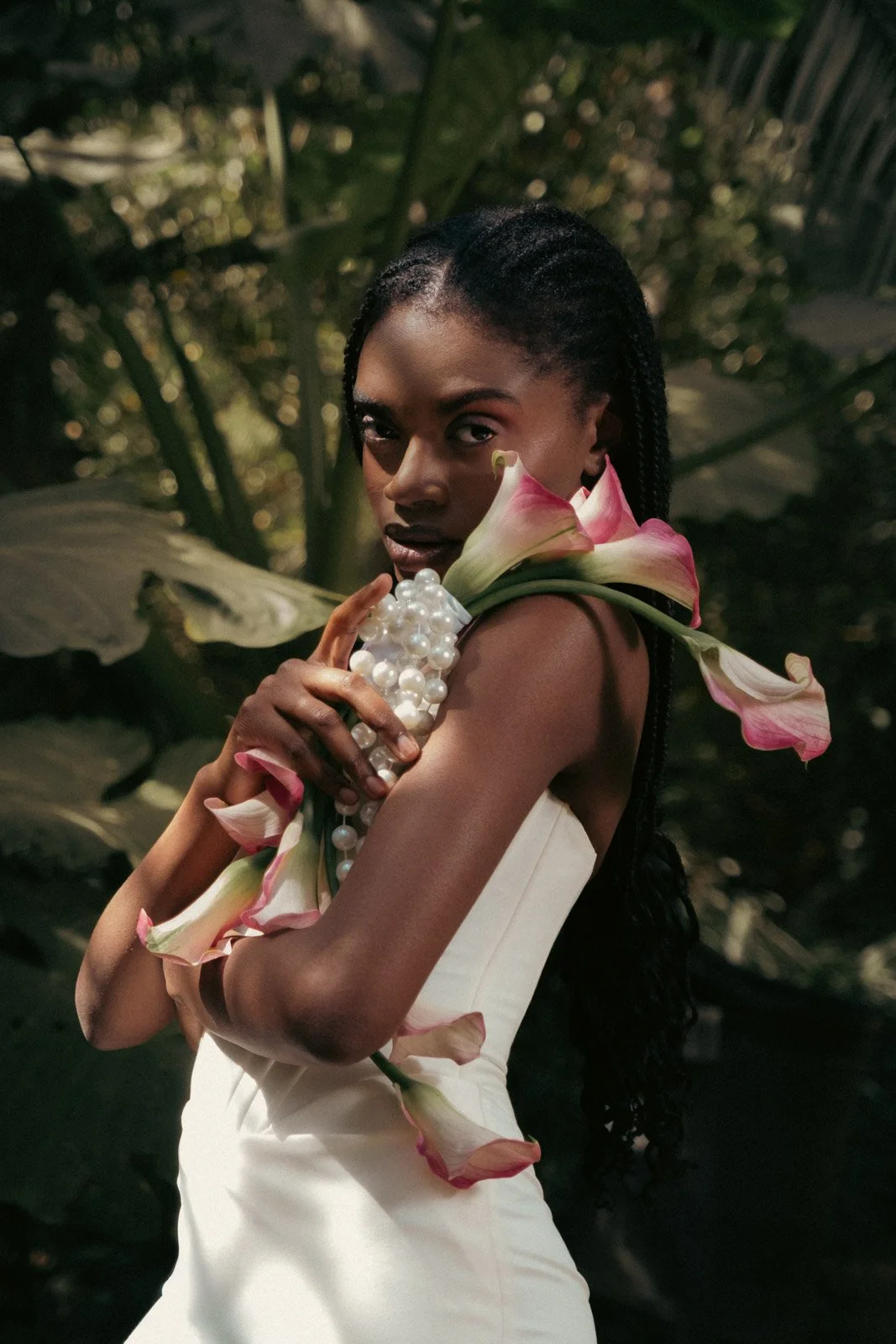 Bridal beauty portrait with floral styling during luxury editorial session