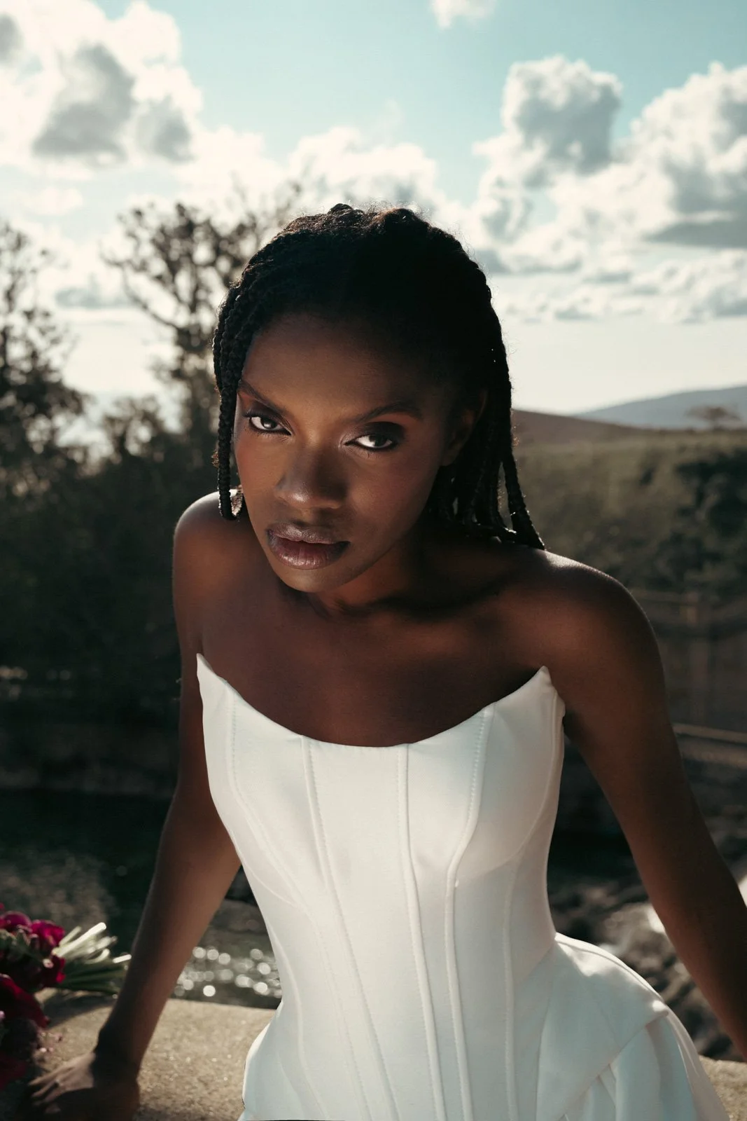 Moody bridal portrait captured during luxury garden wedding editorial