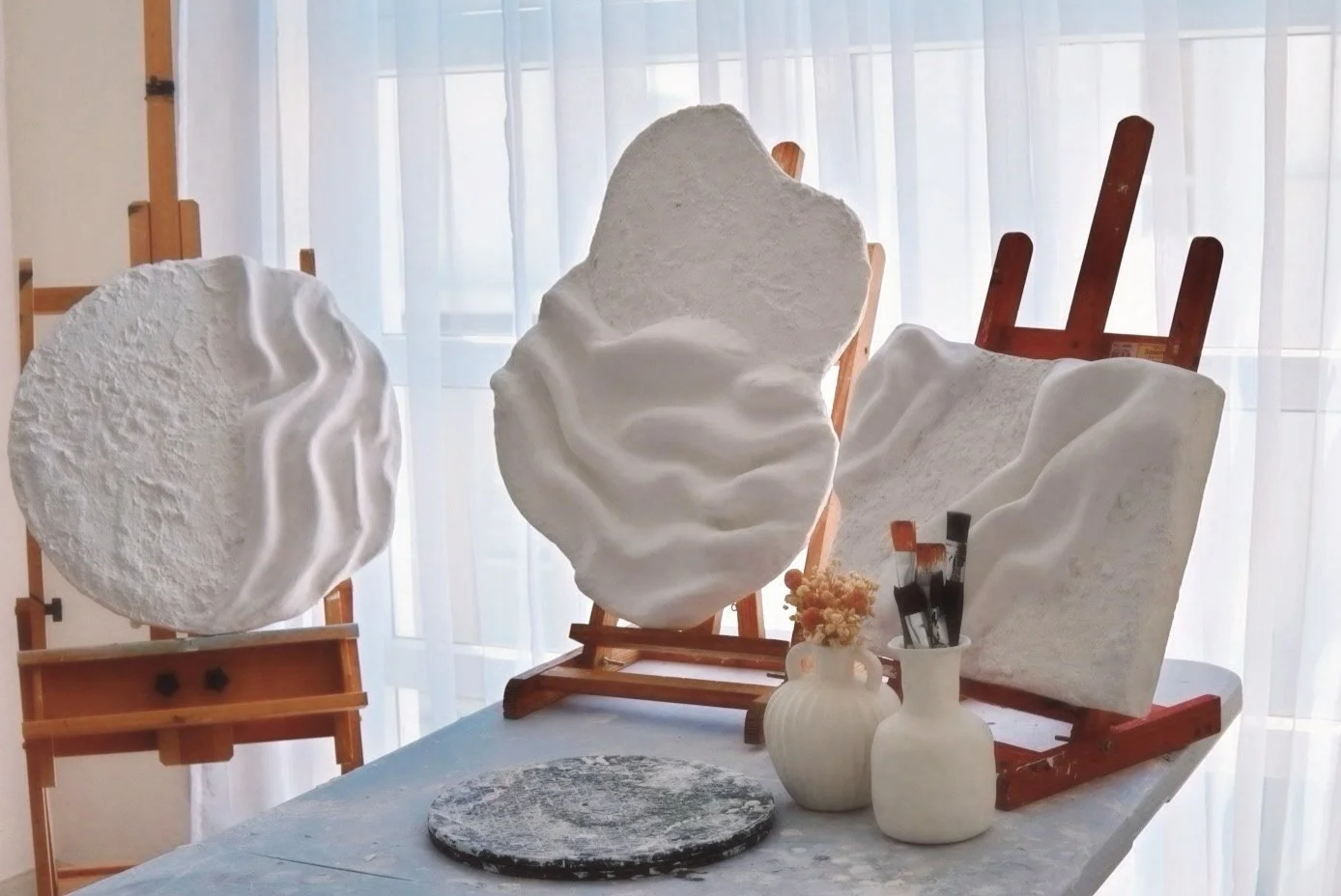 Abstract sculptural studies and studio materials in natural light