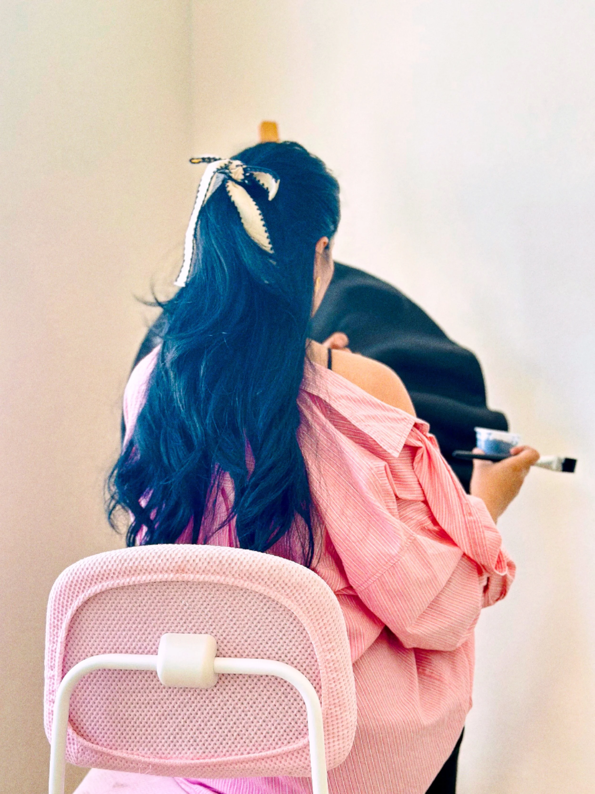 Manila-based artist in a contemporary creative studio